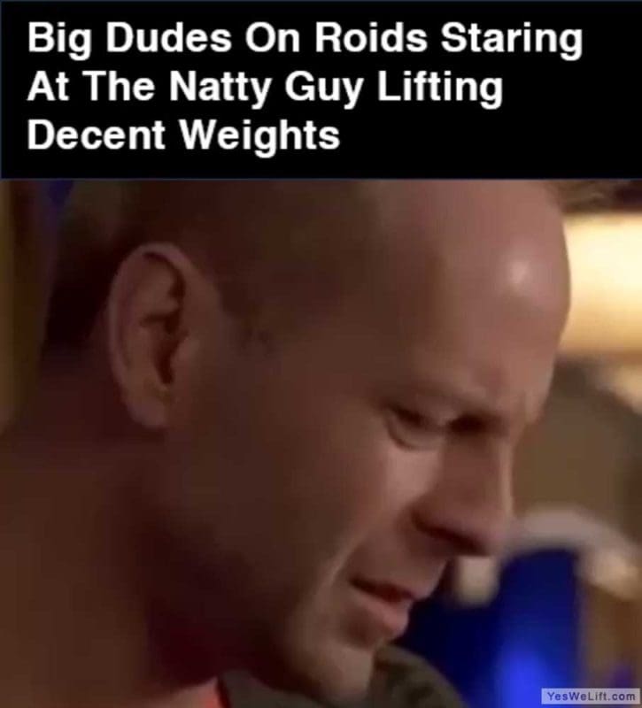 Big Dudes On Roids Staring At The Natty Guy Lifting Decent Weights GIF