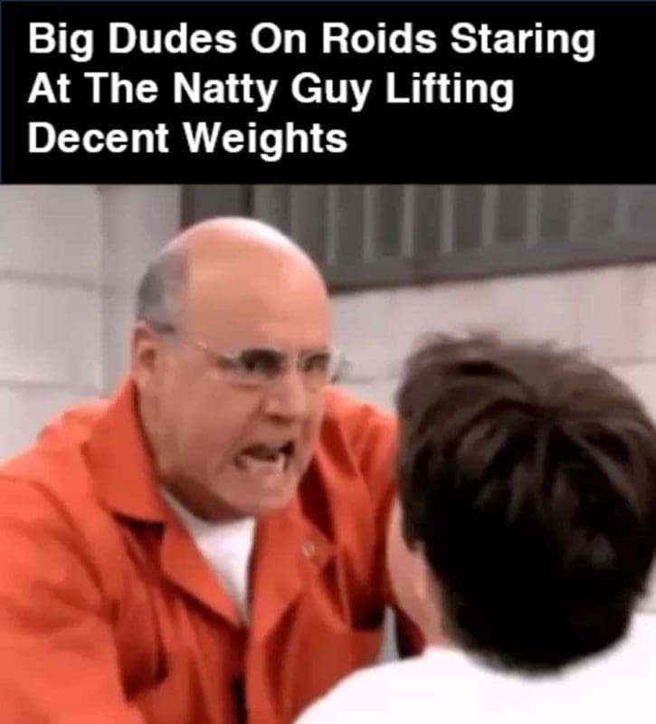 Big Dudes On Roids Staring At The Natty Guy Lifting Decent Weights GIF