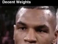 Big Dudes On Roids Staring At The Natty Guy Lifting Decent Weights GIF